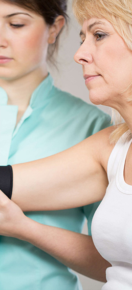 Physiotherapist assessing a patient at Physivity